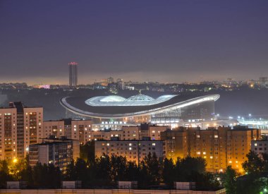 Panoramic view of Kazan Arena stadium in Kazan at night time clipart