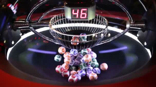 Colourful lottery balls in a machine — Stock Video