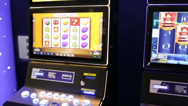 Slot machine in a casino Pan — Stock Video