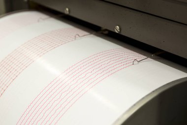 Seismograph recording earthquake clipart
