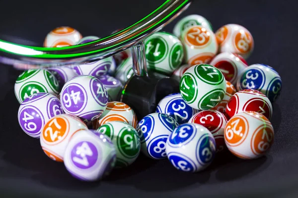 Colourful lottery balls in a machine