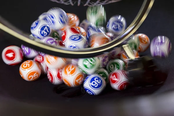 Colourful lottery balls in a machine