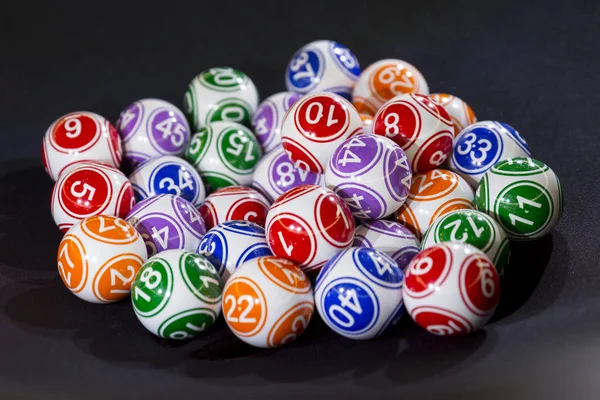 Colourful lottery balls in a machine — Stock Photo, Image