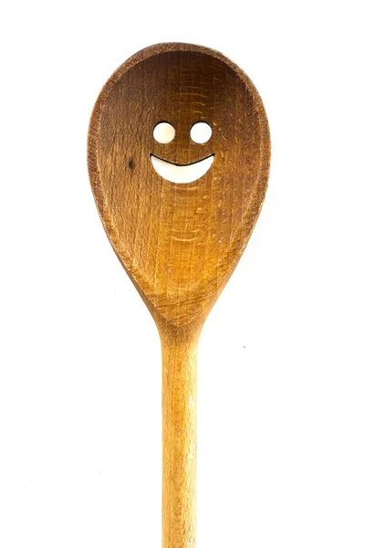 Wooden smiley face spoon on white background — Stock Photo, Image