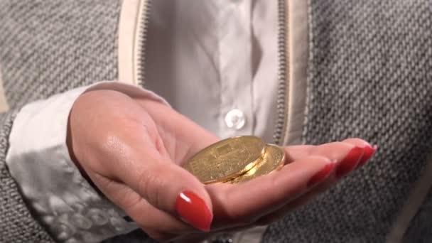 Virtual Cryptocurrency Money Bitcoin Golden Coins Falling Hands Woman Red — Stock Video
