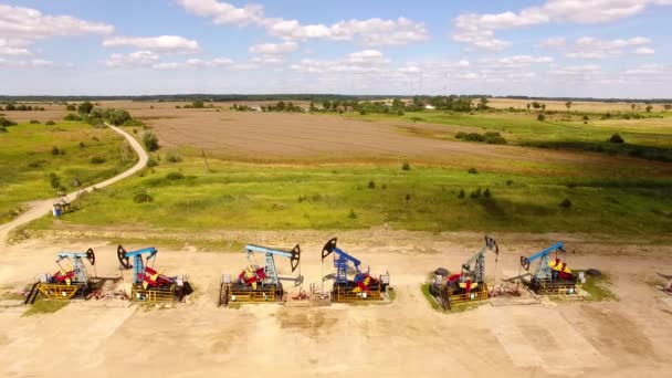 The row of oil derricks in summer — Stock Video