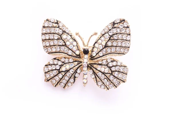 Brooch golden butterfly with diamonds isolated on white — Stock Photo, Image