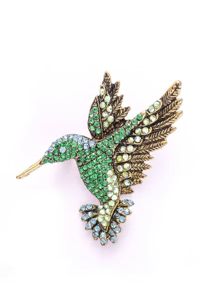 Brooch hummingbird with color diamonds isolated on white — Stock Photo, Image