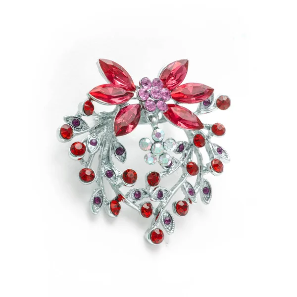 Broche de flor de plata con diamantes rojos aislados en blanco — Foto de Stock