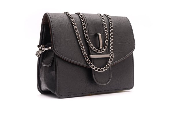 Black leather clutch with chain isolated on white