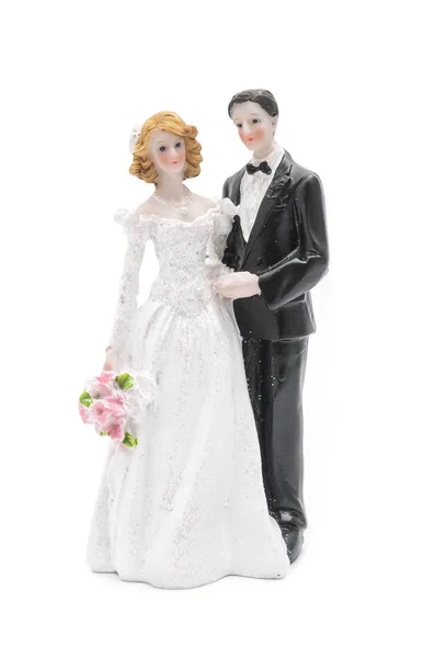 Figurine the bride and groom isolated on white Royalty Free Stock Images