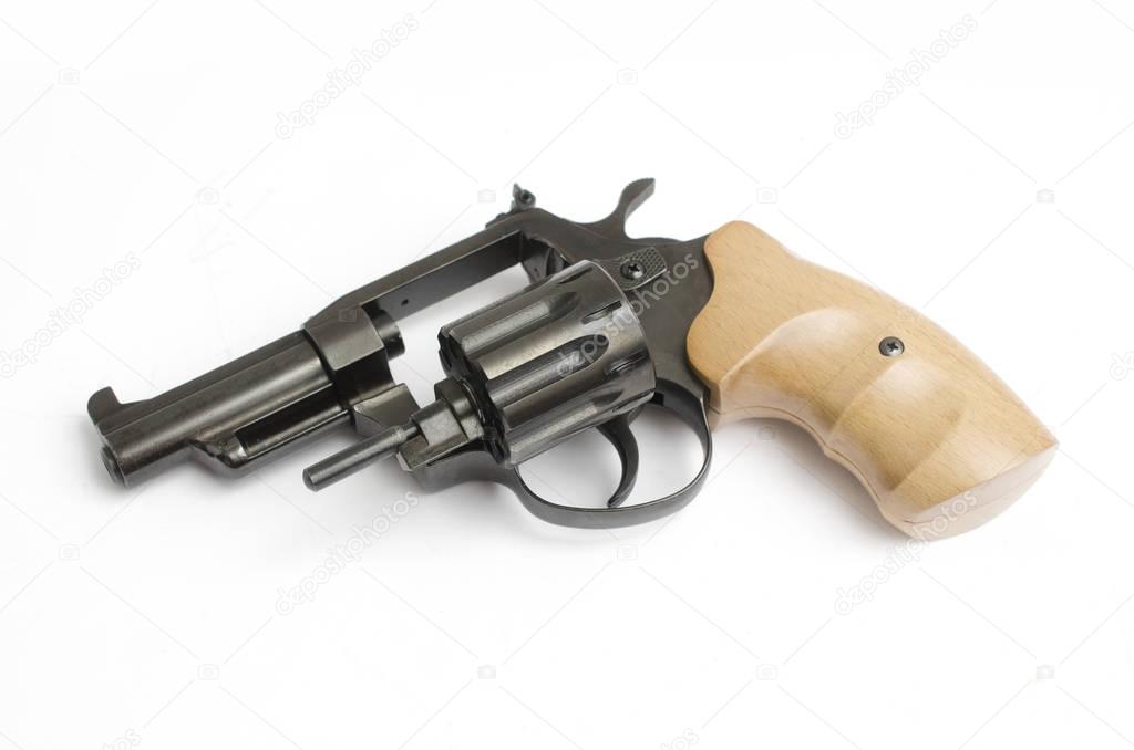 revolver with a wooden handle isolated on a white background