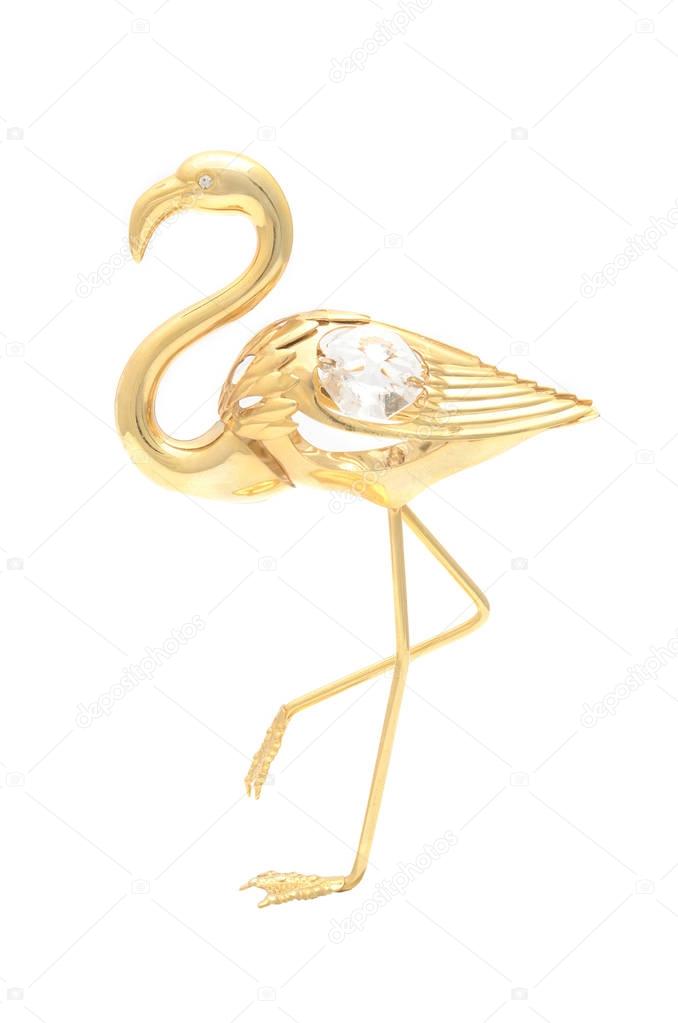gold brooch flamingo isolated on white