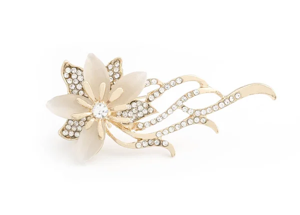 Broche de oro flor con gemas y piedra lunar aislado en blanco —  Fotos de Stock