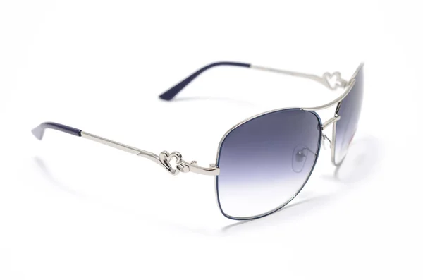 Gafas de sol para mujer en una montura de hierro aislada en blanco —  Fotos de Stock