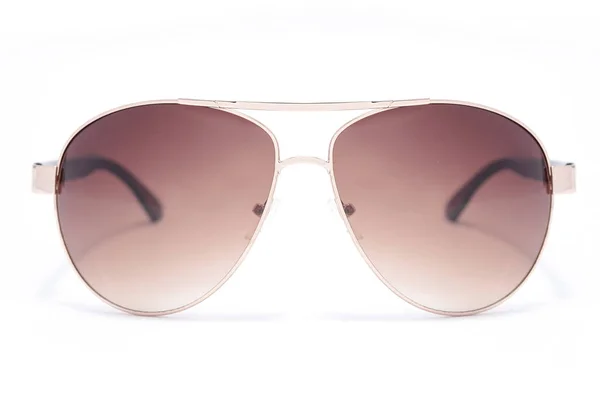 Solglasögon i en järn ram med bruna glas isolerade på vit — Stockfoto