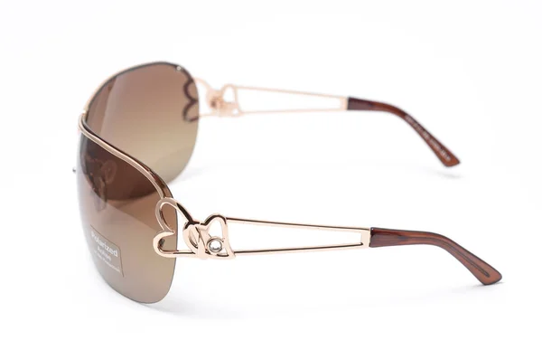Solglasögon i en järn ram med bruna glas isolerade på vit — Stockfoto