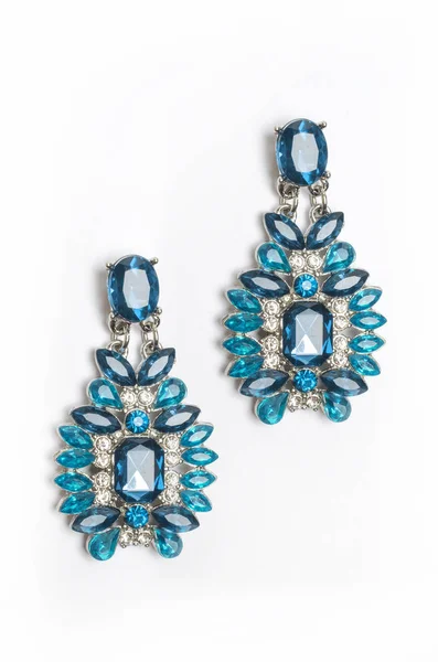Earrings with blue stones isolated on white — Stock Photo, Image