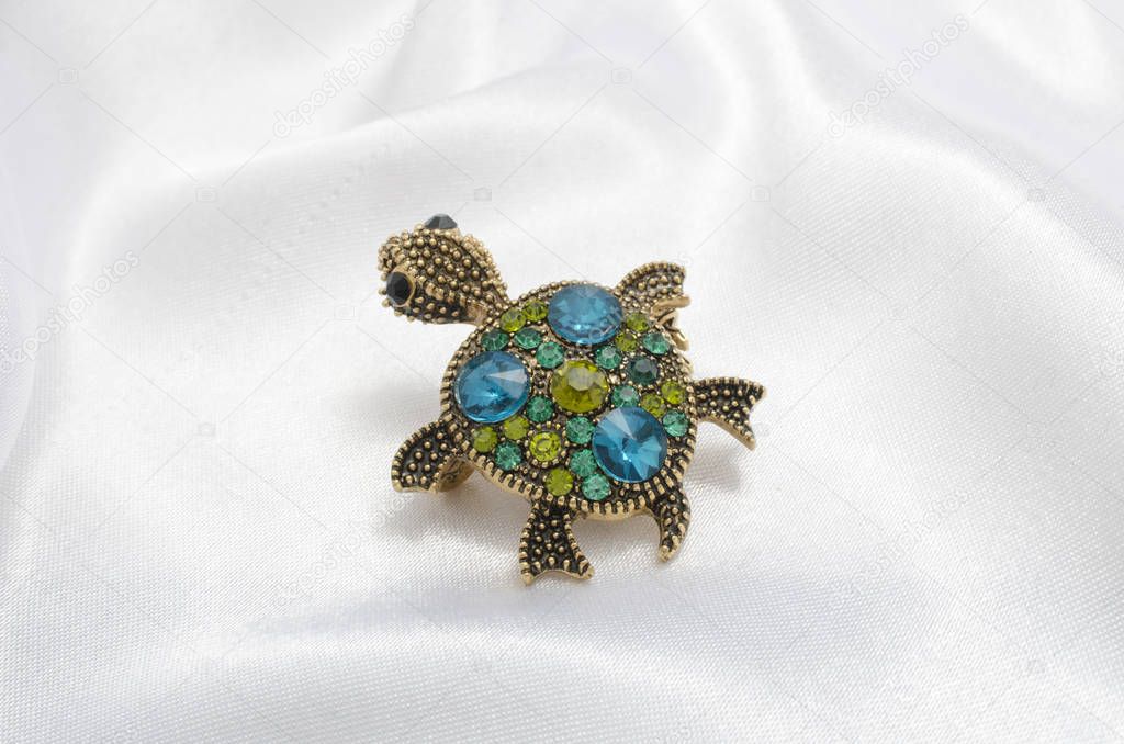 brooch turtle with diamonds on silk