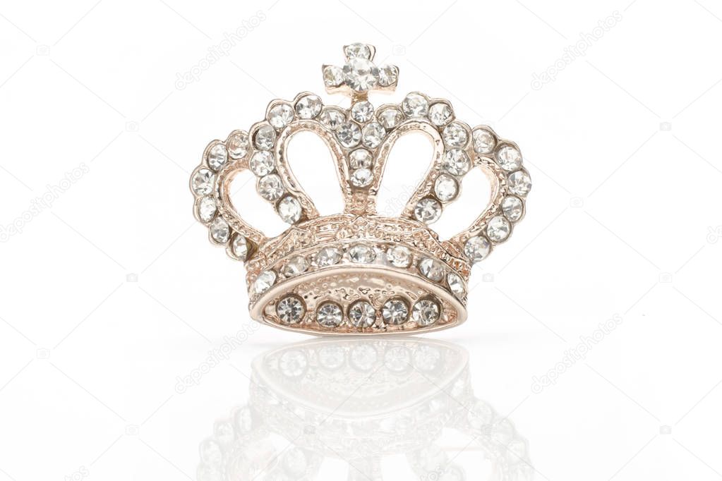 golden brooch crown isolated on white