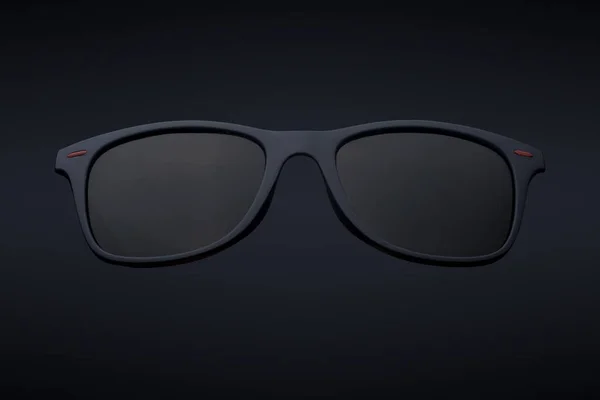 Γυαλιά ηλίου με πλαστικό χείλος απομονώνονται σε μαύρο — Φωτογραφία Αρχείου