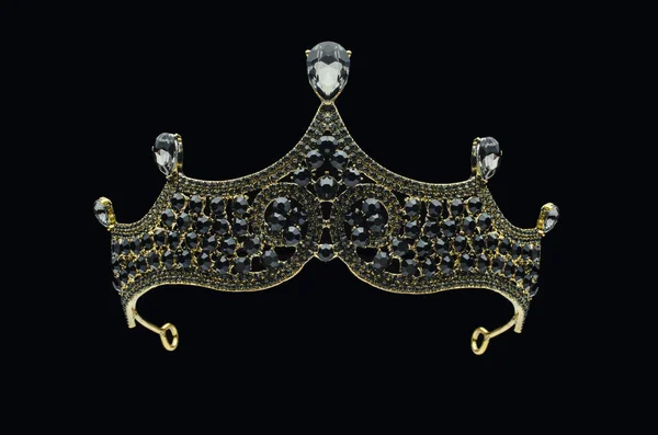 Tiara with black stones and diamonds isolated on black — Stock Photo, Image
