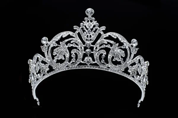 Silver tiara with diamonds on black background — Stock Photo, Image