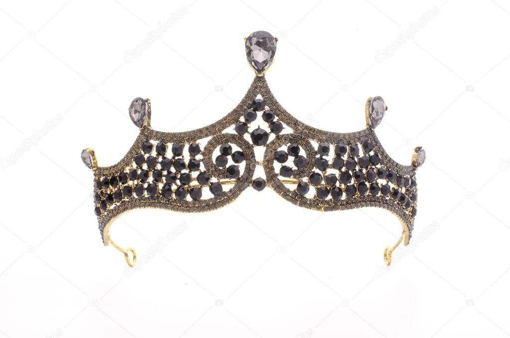 tiara with black stones and diamonds isolated on white