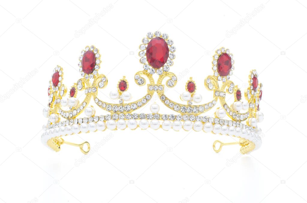 golden crown with rubies and pearls on a white background