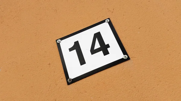 Fourteen house number sign