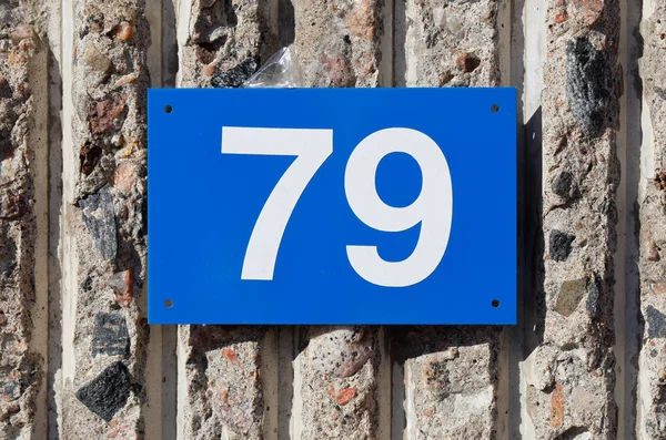 Numer 79 na niebieski blate — Zdjęcie stockowe