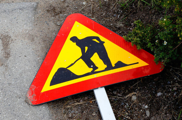 Grounded roadwork sign