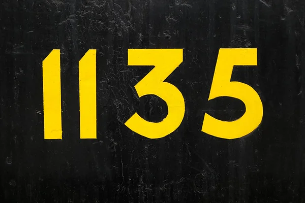 Nomor 1135 di hitam — Stok Foto