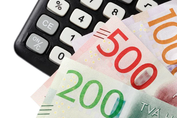 Dinheiro sueco em uma calculadora — Fotografia de Stock