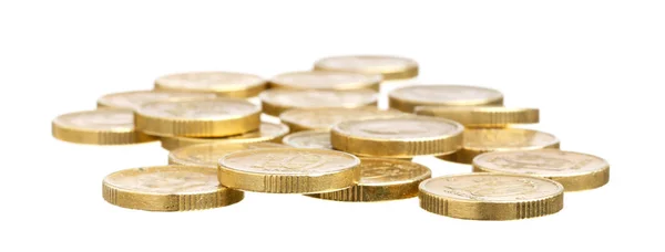 Gyllene mynt på vit — Stockfoto