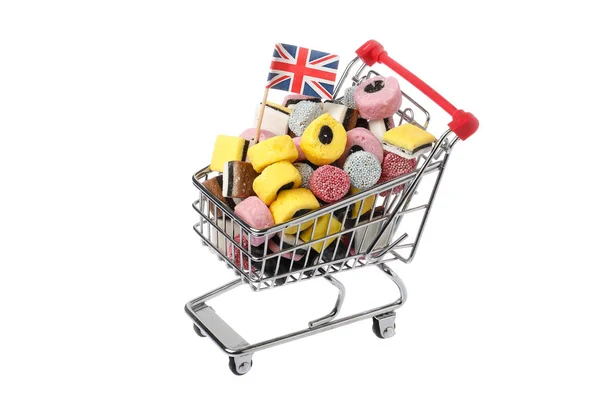 Carrello della spesa britannico pieno di caramelle — Foto Stock