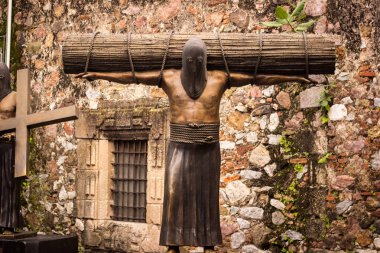 Hooded Medieval Executioner statue in Taxco Guerrero Mexico. clipart