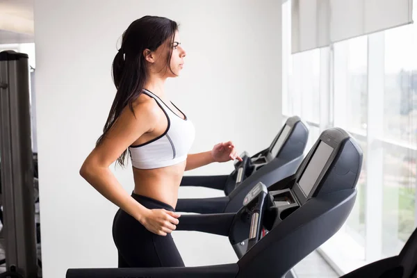 Young woman workout in gym treadmill healthy lifestyle.