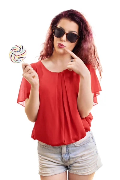 Mooi roodharig meisje met een lolly — Stockfoto