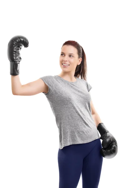 Mädchen mit Boxhandschuhen hebt zur Feier die Hand — Stockfoto