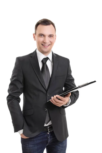 Smiling attractive young businessman holding a clipboard — ストック写真