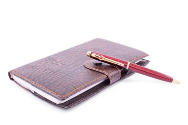 Deri defter ve kalem.