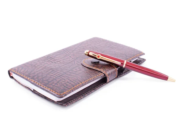 Leather planner notebook with a pen Stock Image