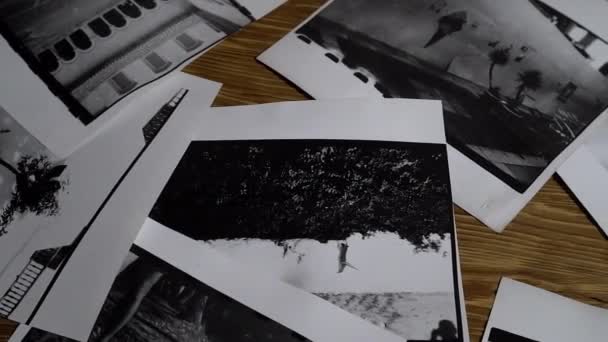 A trip through the old photographs scattered — Stock Video