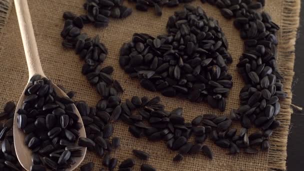 Sunflower seeds and oil close up. — Stock Video