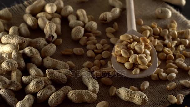 Close up with peanuts rotating. — Stock Video