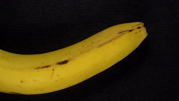 Banane Nahaufnahme Hintergrund. — Stockvideo