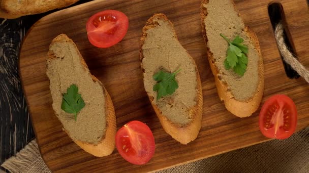 Fresh pate with bread on wooden table — Stock Video