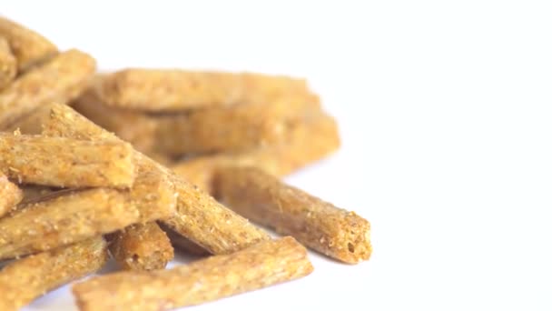 Часть вращающихся хлебных чипов как бесшовные зацикленные 4K UHD кадры — стоковое видео