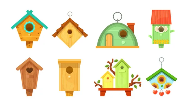 Casas decorativas de madera para pájaros de primavera. Casas de aves de jardín para la alimentación de aves . — Archivo Imágenes Vectoriales